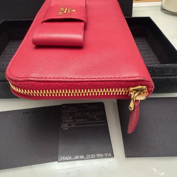 Authentic pink Prada Bow Wallet with box, authenticity card,COA. - Picture 7 of 17